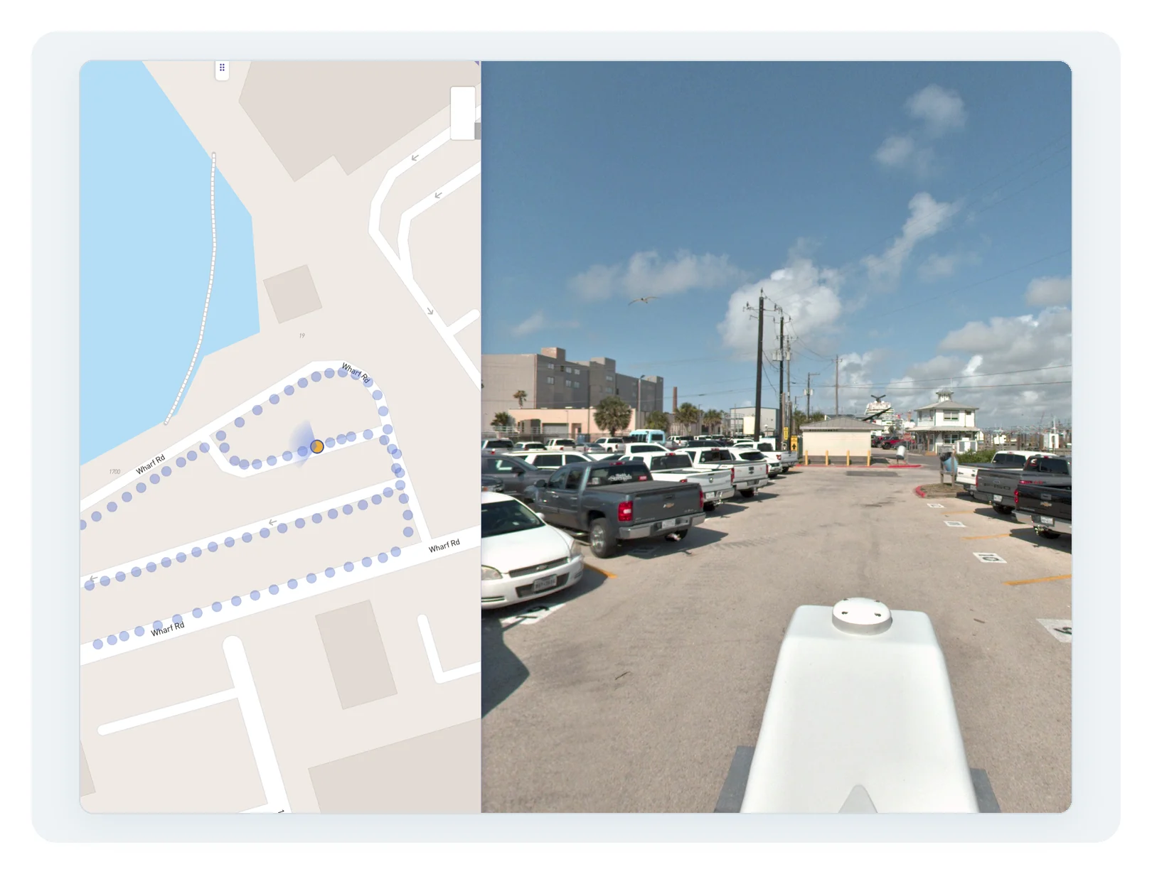 A street-level 360-degree photo open beside the map that locates it, with the capture route running along Wharf Road and the selected point highlighted